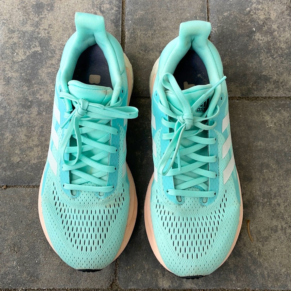 Adidas Solarglide Boost running sneakers.